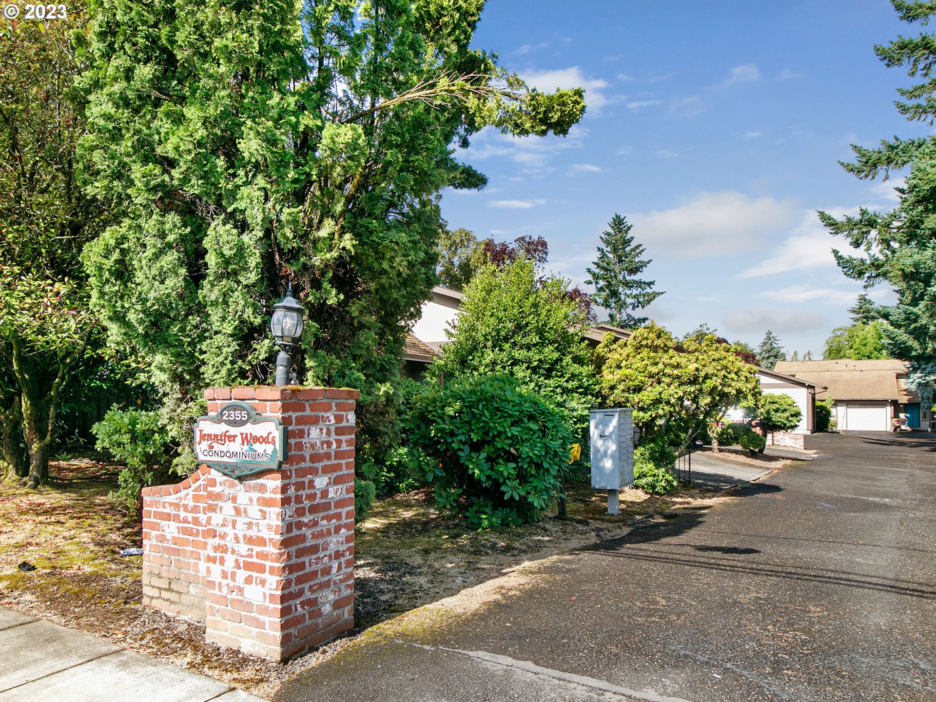 2369 Southeast 112th Avenue, Unit 7 Portland, OR 97216 - Photo 32 of 32 front view of a house with a street