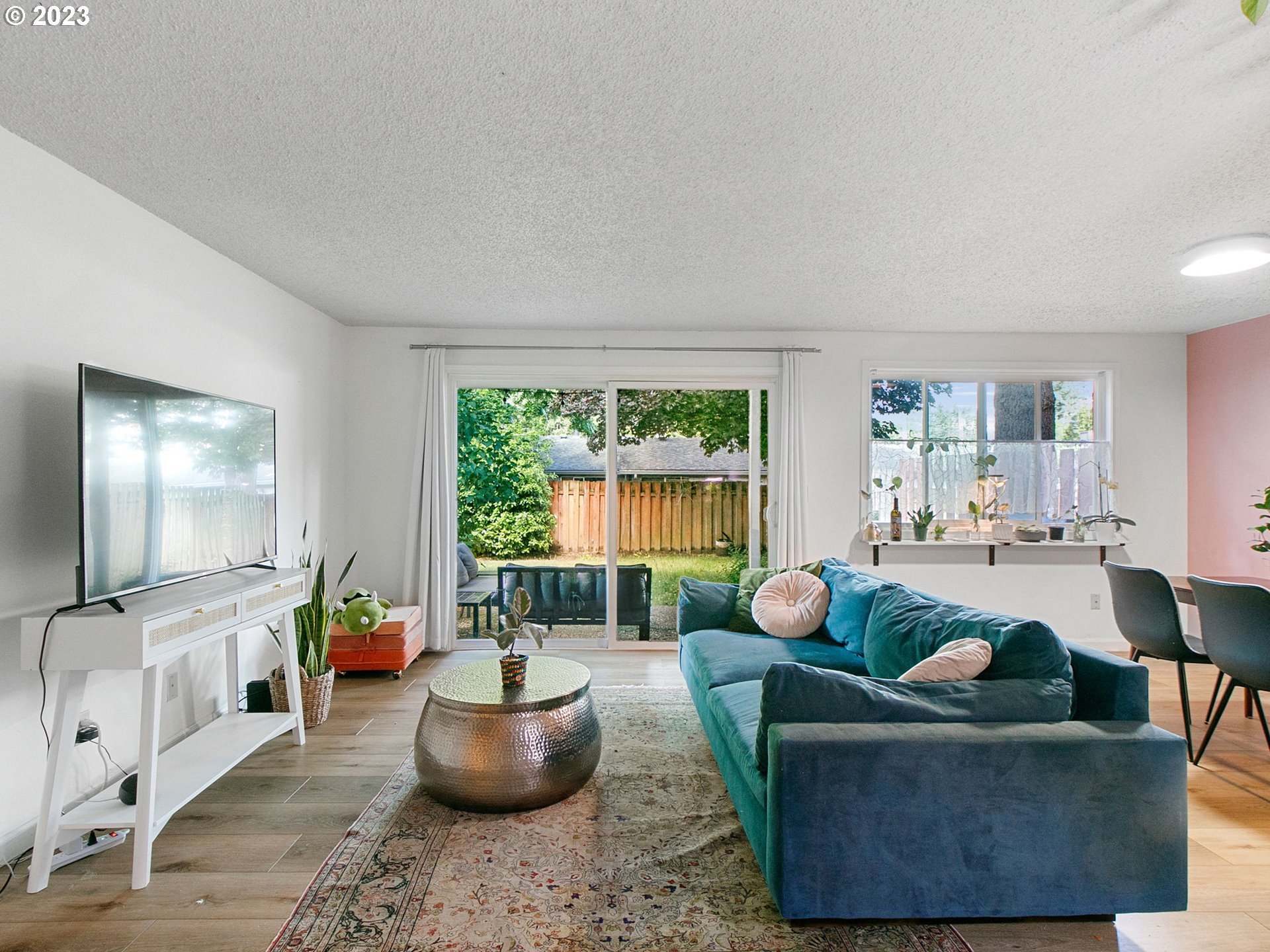 2369 Southeast 112th Avenue, Unit 7 Portland, OR 97216 - Photo 4 of 32 a living room with furniture and a potted plant