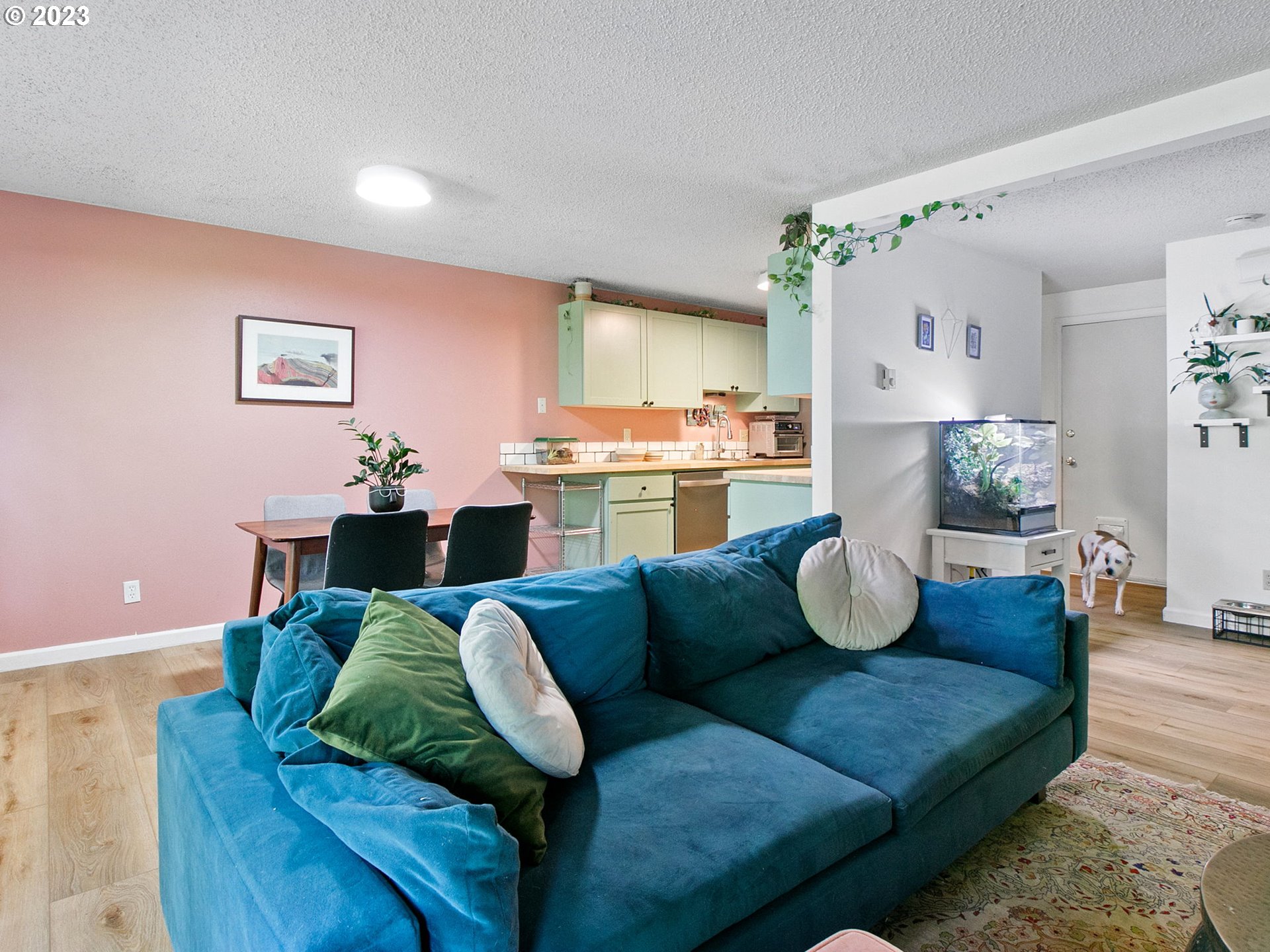 2369 Southeast 112th Avenue, Unit 7 Portland, OR 97216 - Photo 8 of 32 a living room with furniture and a wooden floor