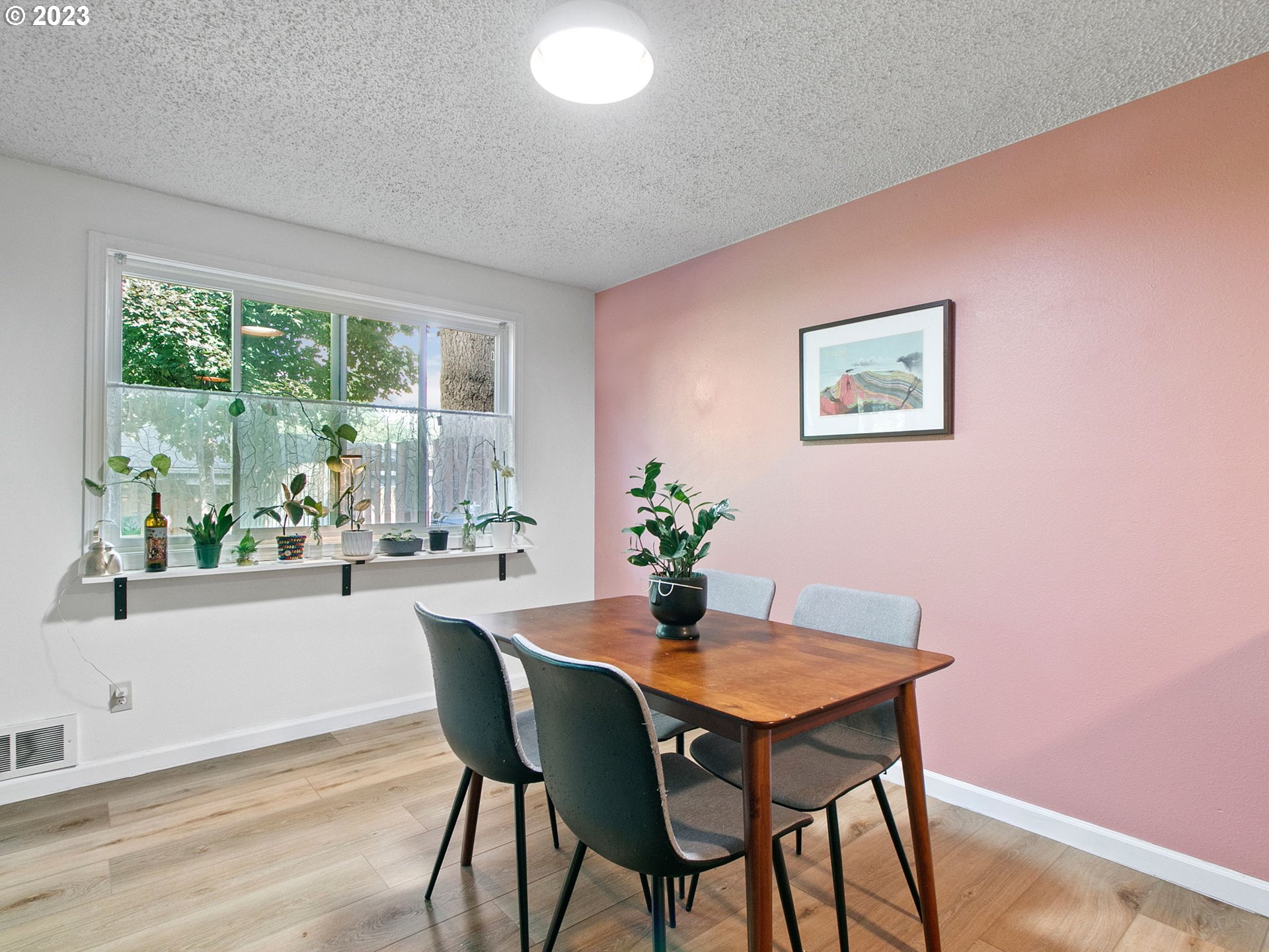 2369 Southeast 112th Avenue, Unit 7 Portland, OR 97216 - Photo 9 of 32 a dining room with furniture and window