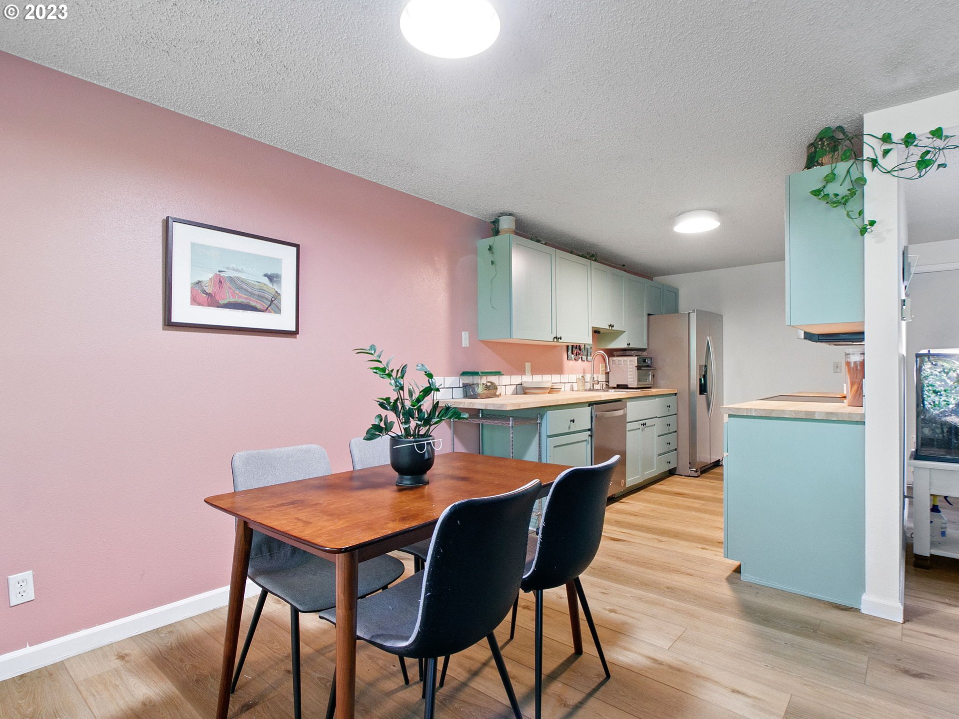 2369 Southeast 112th Avenue, Unit 7 Portland, OR 97216 - Photo 10 of 32 a dining room with a table and chairs