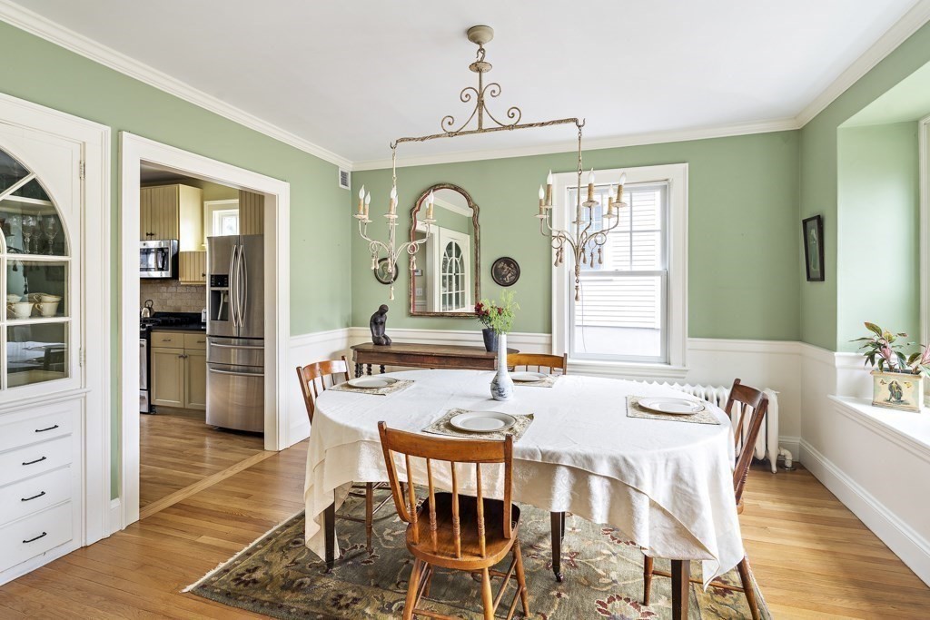 39 Somerset Road Brookline, MA 02445 - Photo 16 of 41 a view of a dining room with furniture window and wooden floor