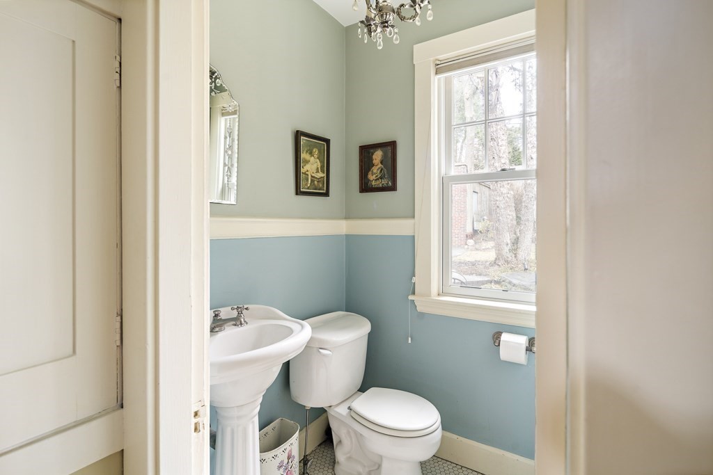 39 Somerset Road Brookline, MA 02445 - Photo 23 of 41 a white toilet sitting next to a bathroom sink