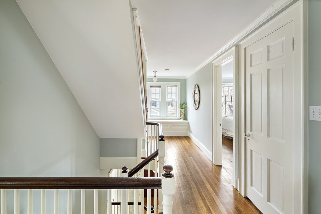 39 Somerset Road Brookline, MA 02445 - Photo 24 of 41 a view of a hallway with wooden floor and staircase