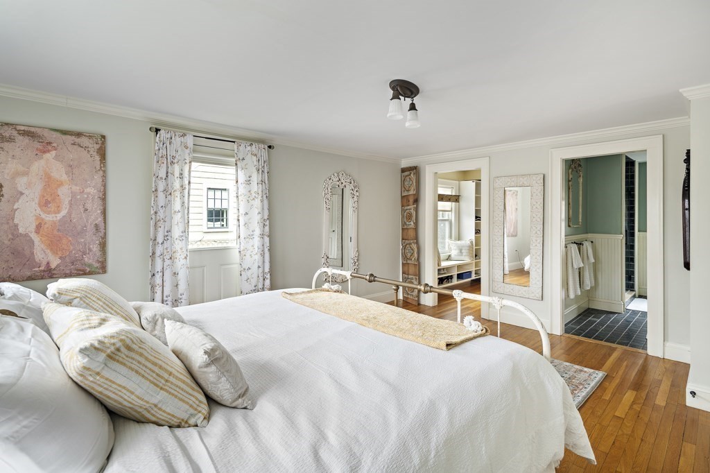 39 Somerset Road Brookline, MA 02445 - Photo 26 of 41 a bedroom with a bed and wooden floor