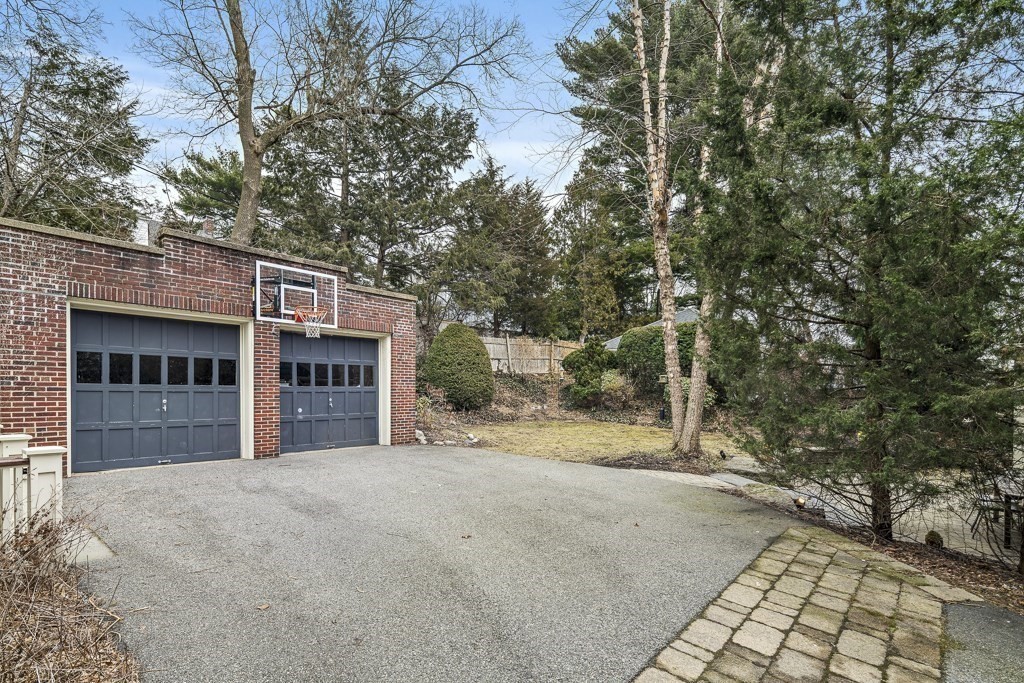 39 Somerset Road Brookline, MA 02445 - Photo 41 of 41 a view of a house with a tree in front of it