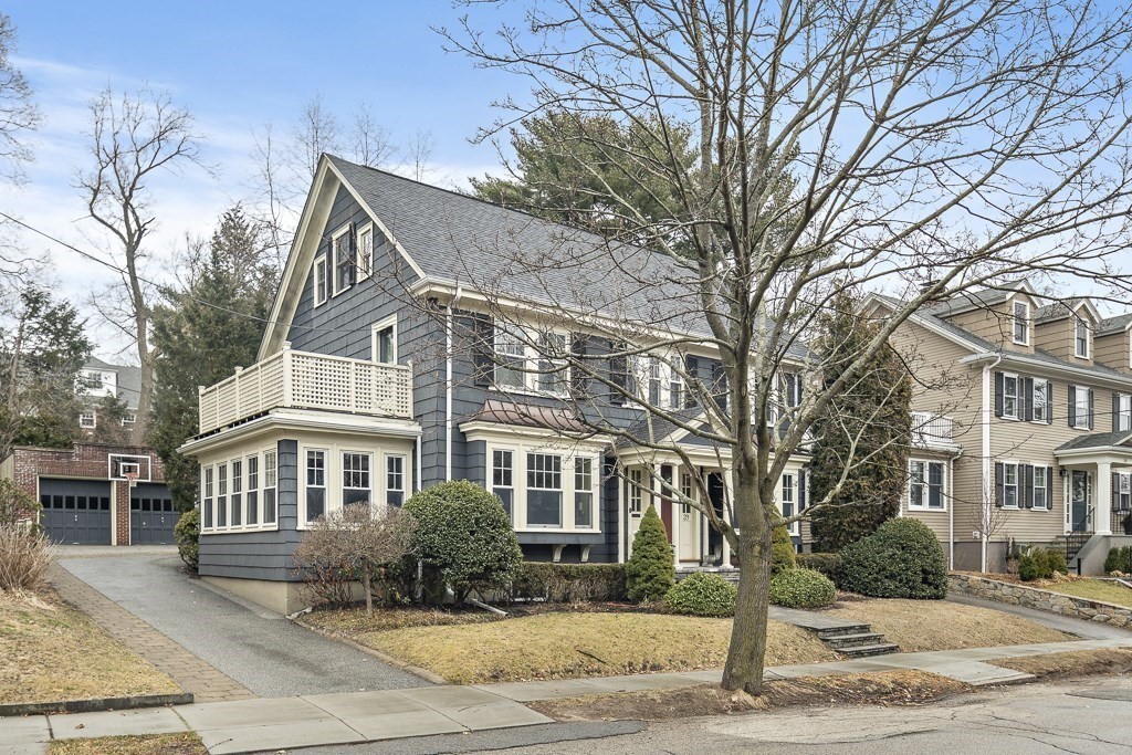 39 Somerset Road Brookline, MA 02445 - Photo 5 of 41 a view of a white house with a large tree