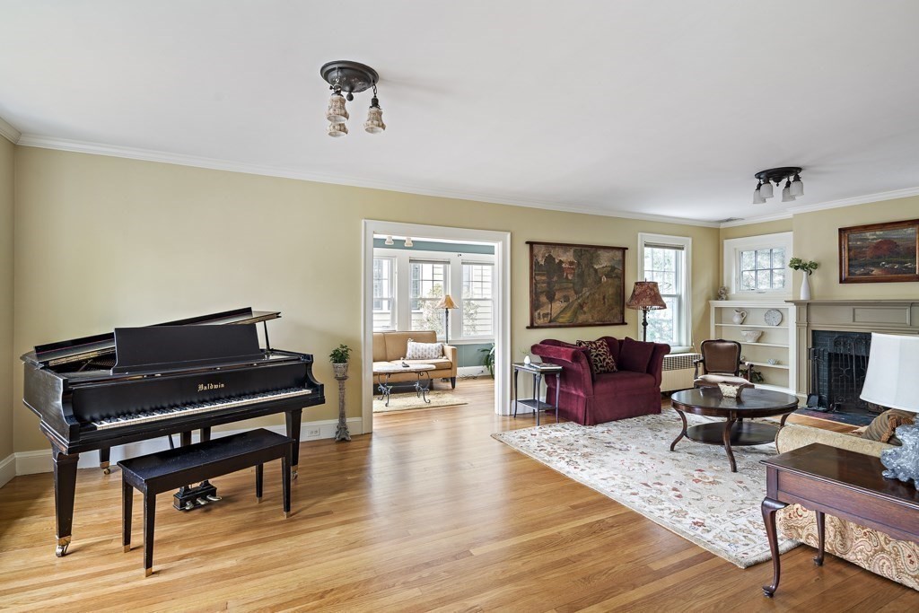 39 Somerset Road Brookline, MA 02445 - Photo 9 of 41 a living room with furniture and a fireplace