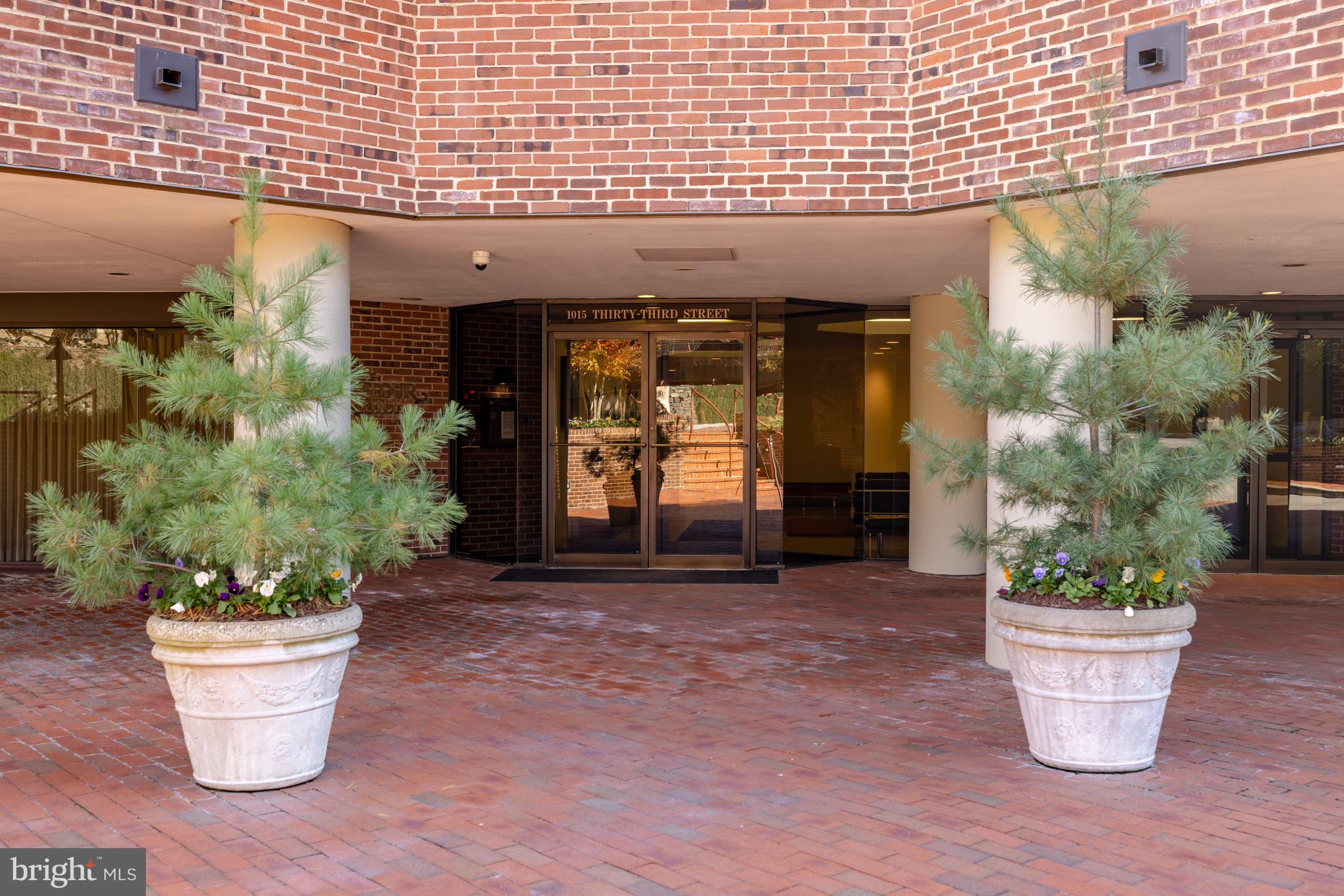 1015 33rd Street Northwest, Unit 507 Washington, DC 20007 - Photo 16 of 20 a front view of a house with garden
