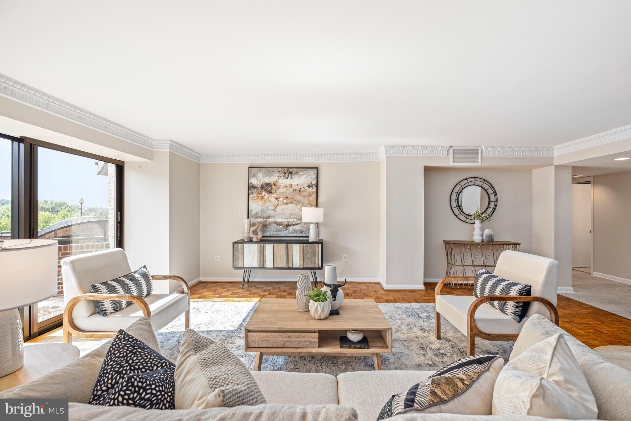 1015 33rd Street Northwest, Unit 507 Washington, DC 20007 - Photo 3 of 20 a living room with furniture and a window