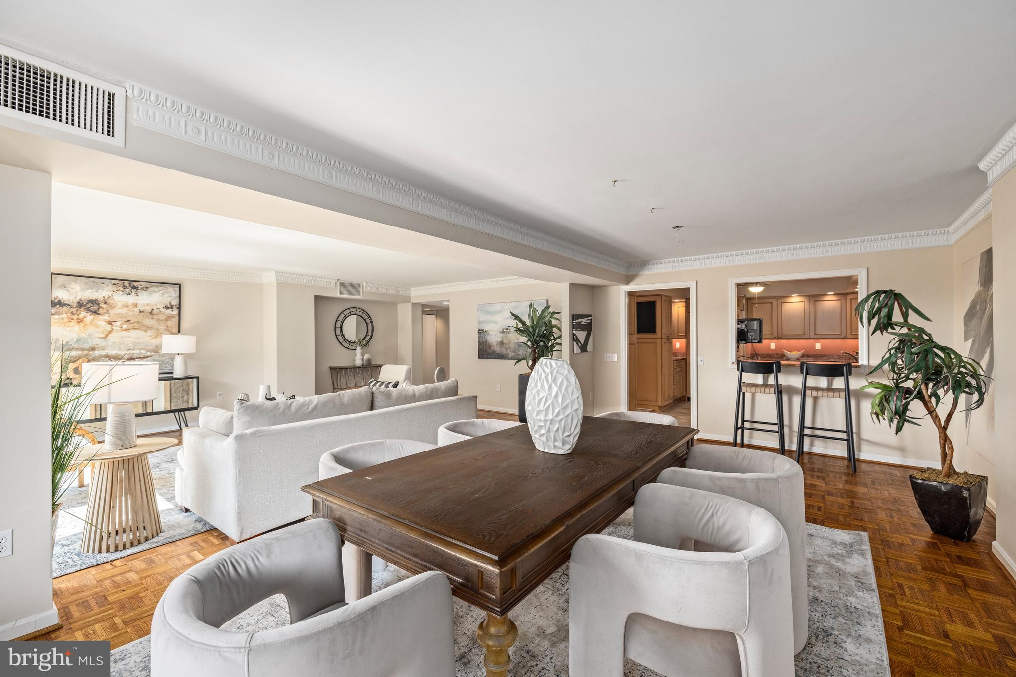 1015 33rd Street Northwest, Unit 507 Washington, DC 20007 - Photo 6 of 20 a living room with furniture and wooden floor