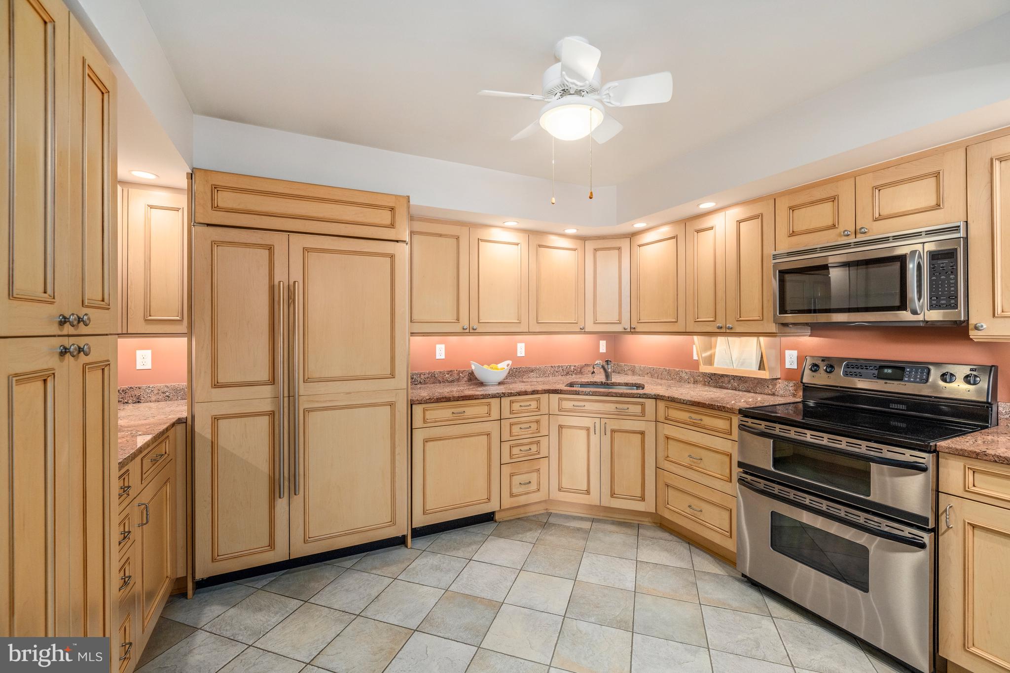 1015 33rd Street Northwest, Unit 507 Washington, DC 20007 - Photo 7 of 20 a kitchen with appliances cabinets and a sink