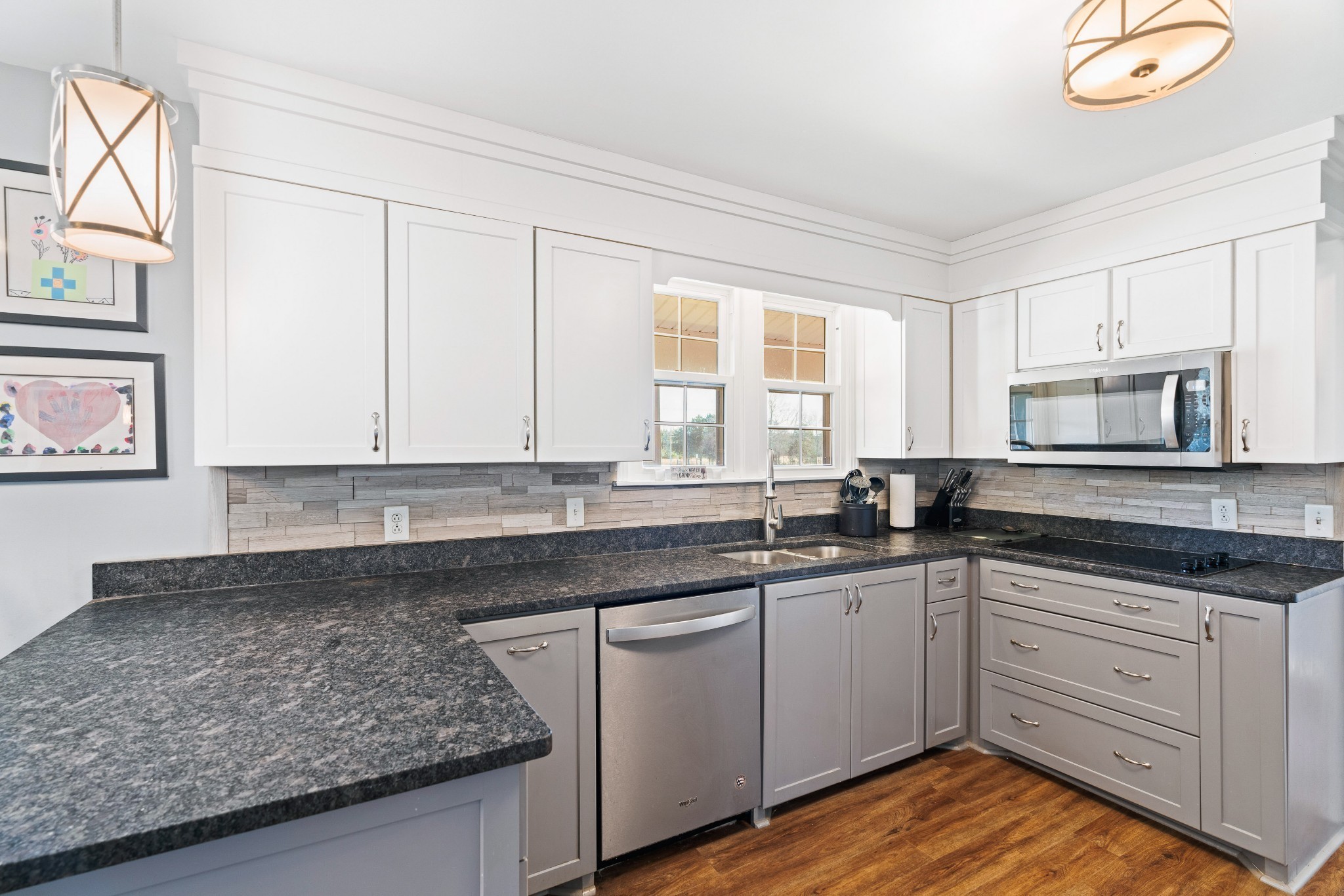 1630 McCrary Road Lebanon, TN 37090 - Photo 14 of 46 a kitchen with stainless steel appliances granite countertop a sink stove and cabinets