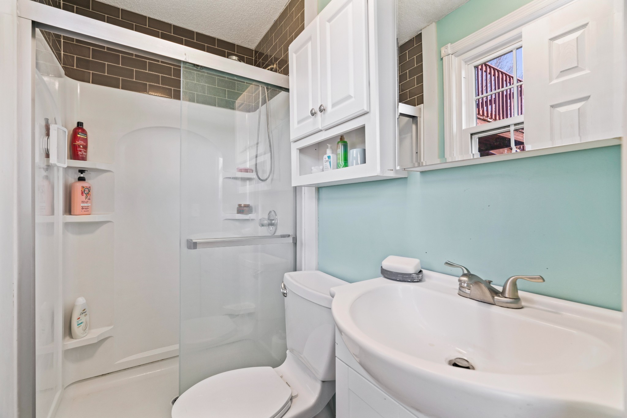 1630 McCrary Road Lebanon, TN 37090 - Photo 25 of 46 a bathroom with a sink a toilet and shower curtain