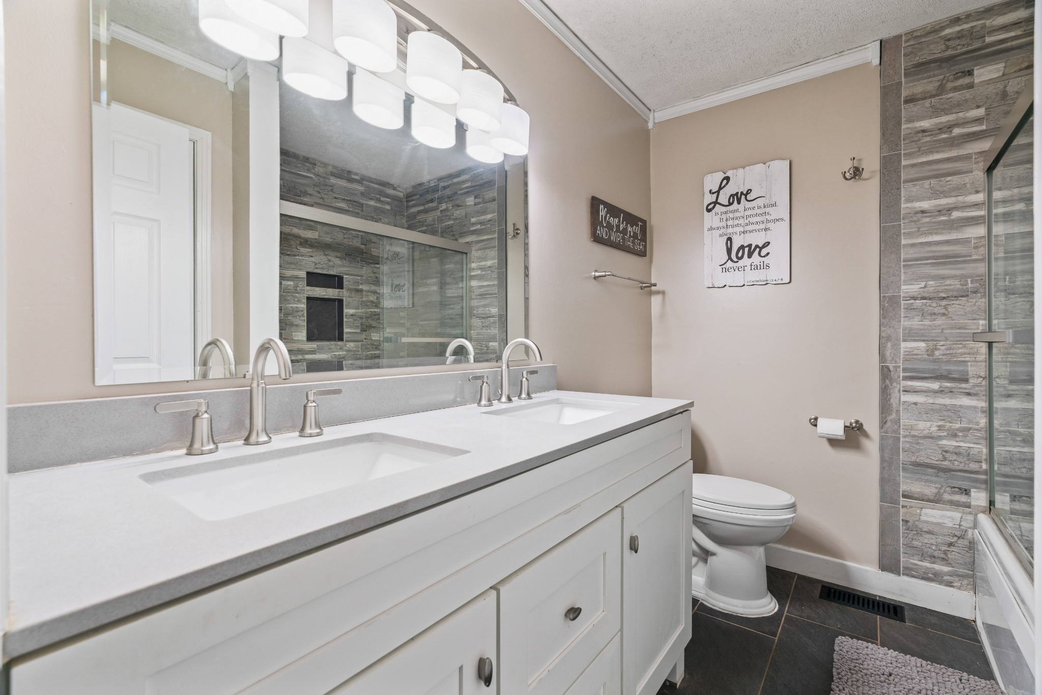 1630 McCrary Road Lebanon, TN 37090 - Photo 27 of 46 a bathroom with a sink a toilet and a mirror