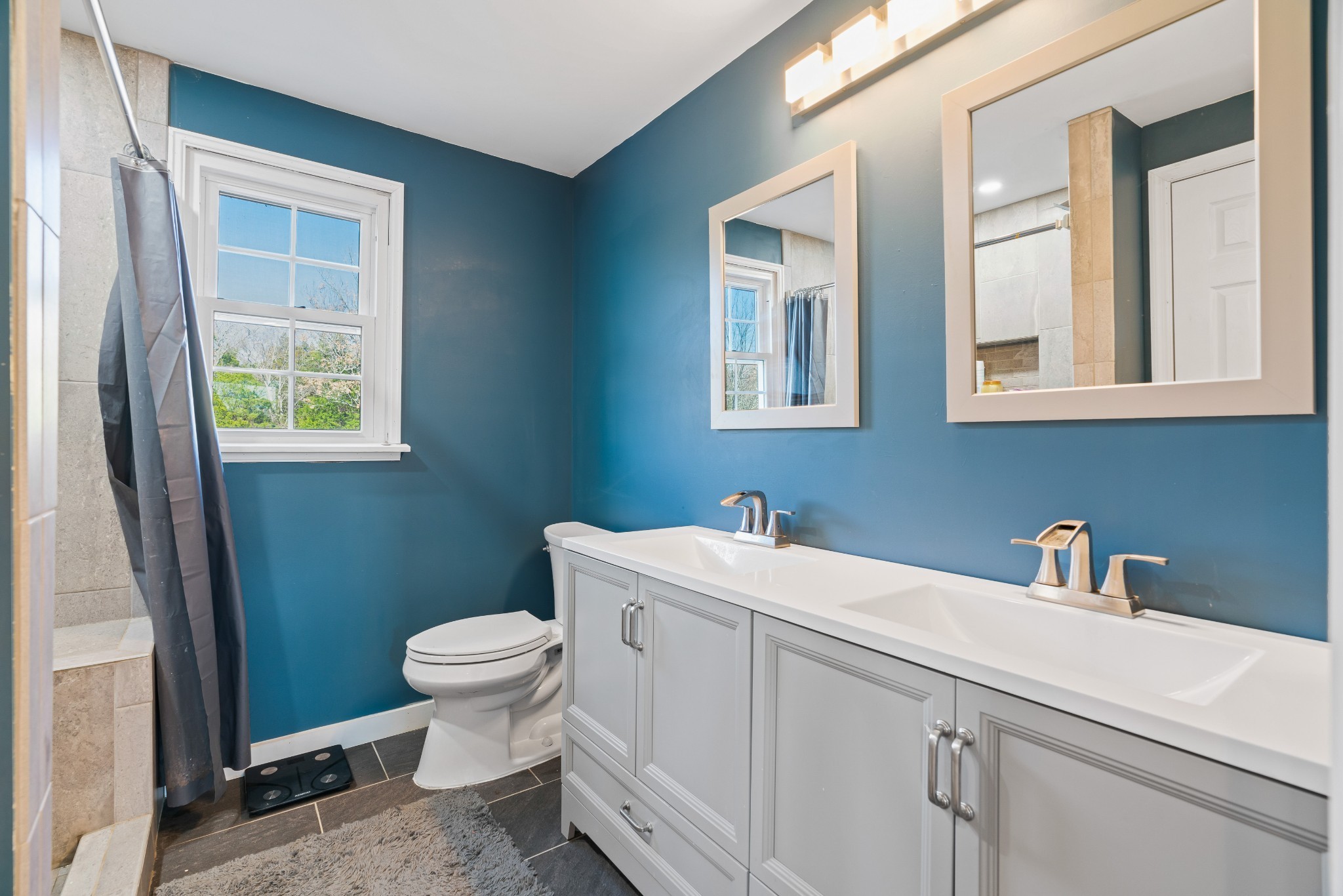 1630 McCrary Road Lebanon, TN 37090 - Photo 33 of 46 a bathroom with a toilet sink and mirror