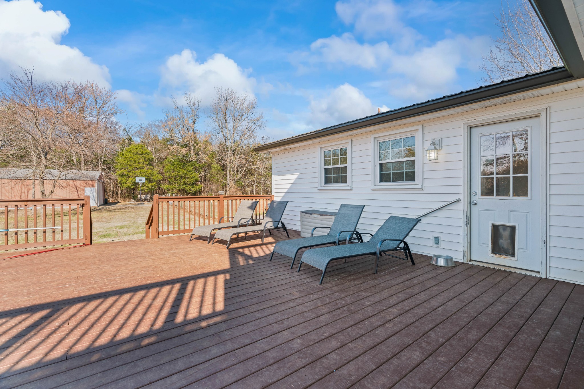 1630 McCrary Road Lebanon, TN 37090 - Photo 39 of 46 a backyard of a house with wooden floor barbeque oven and outdoor seating