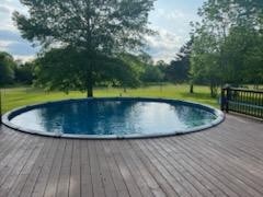 1630 McCrary Road Lebanon, TN 37090 - Photo 45 of 46 a view of a swimming pool with a garden and trees