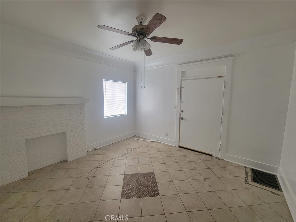 2047 Cambridge Street, Unit A Los Angeles, CA 90006 - Photo 3 of 10 a view of an empty room with a window
