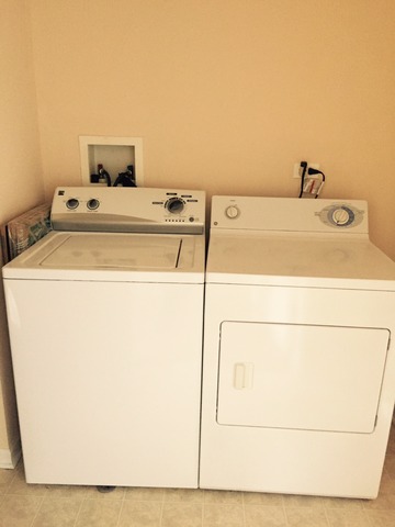 720 Prestwick Lane, Unit 303 Wheeling, IL 60090 - Photo 13 of 15 a utility room with dryer and washer