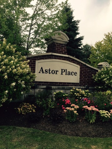 720 Prestwick Lane, Unit 303 Wheeling, IL 60090 - Photo 2 of 15 a sign on the side of a building