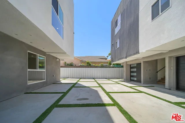 a view of swimming pool in front of building