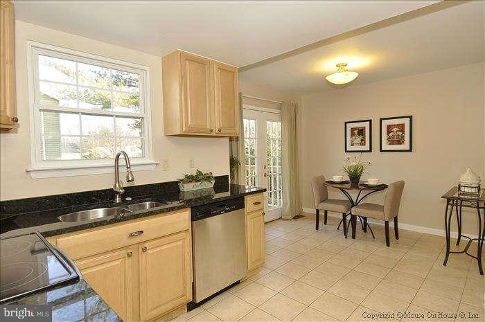 2521 Forest Glen Road Silver Spring, MD 20910 - Photo 10 of 30 STAINLESS APPLIANCES AND GRANITE