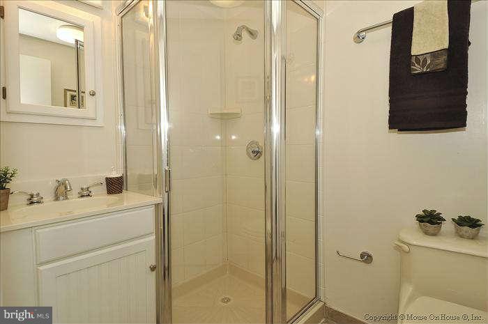 2521 Forest Glen Road Silver Spring, MD 20910 - Photo 16 of 30 MASTER BATH WITH SHOWER AND CERAMIC TILE