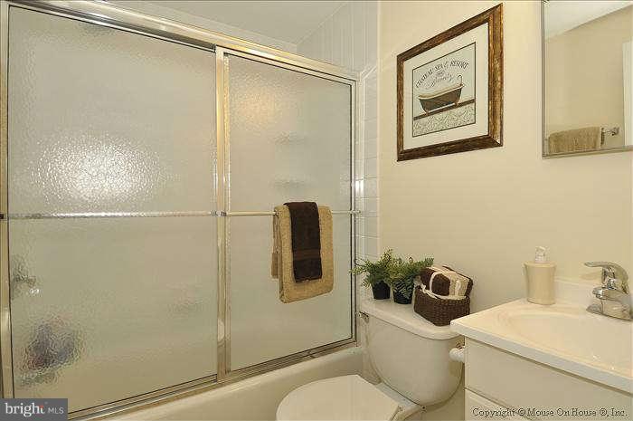 2521 Forest Glen Road Silver Spring, MD 20910 - Photo 19 of 30 HALL BATH WITH TUB AND CERAMIC TILE