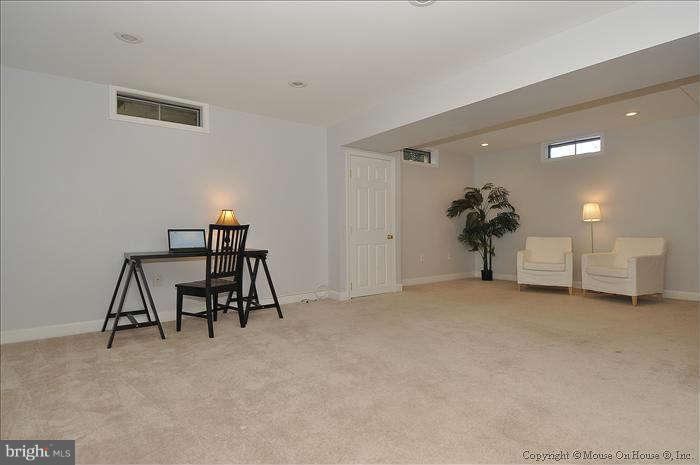 2521 Forest Glen Road Silver Spring, MD 20910 - Photo 22 of 30 REC ROOM WITH RECESSED LIGHTING AND CARPETING