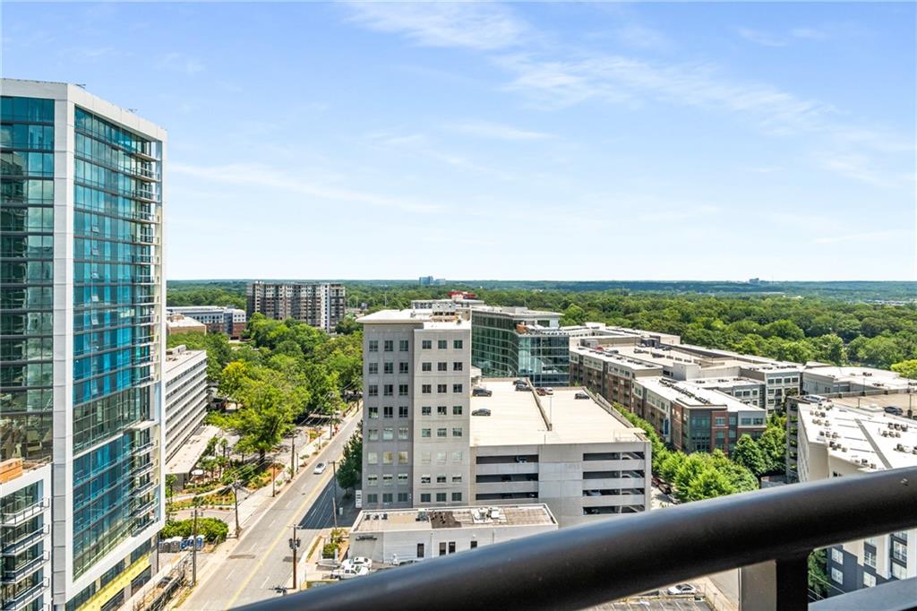 325 East Paces Ferry Road Northeast, Unit 1704 Atlanta, GA 30305 - Photo 8 of 29 a view of a city from a balcony