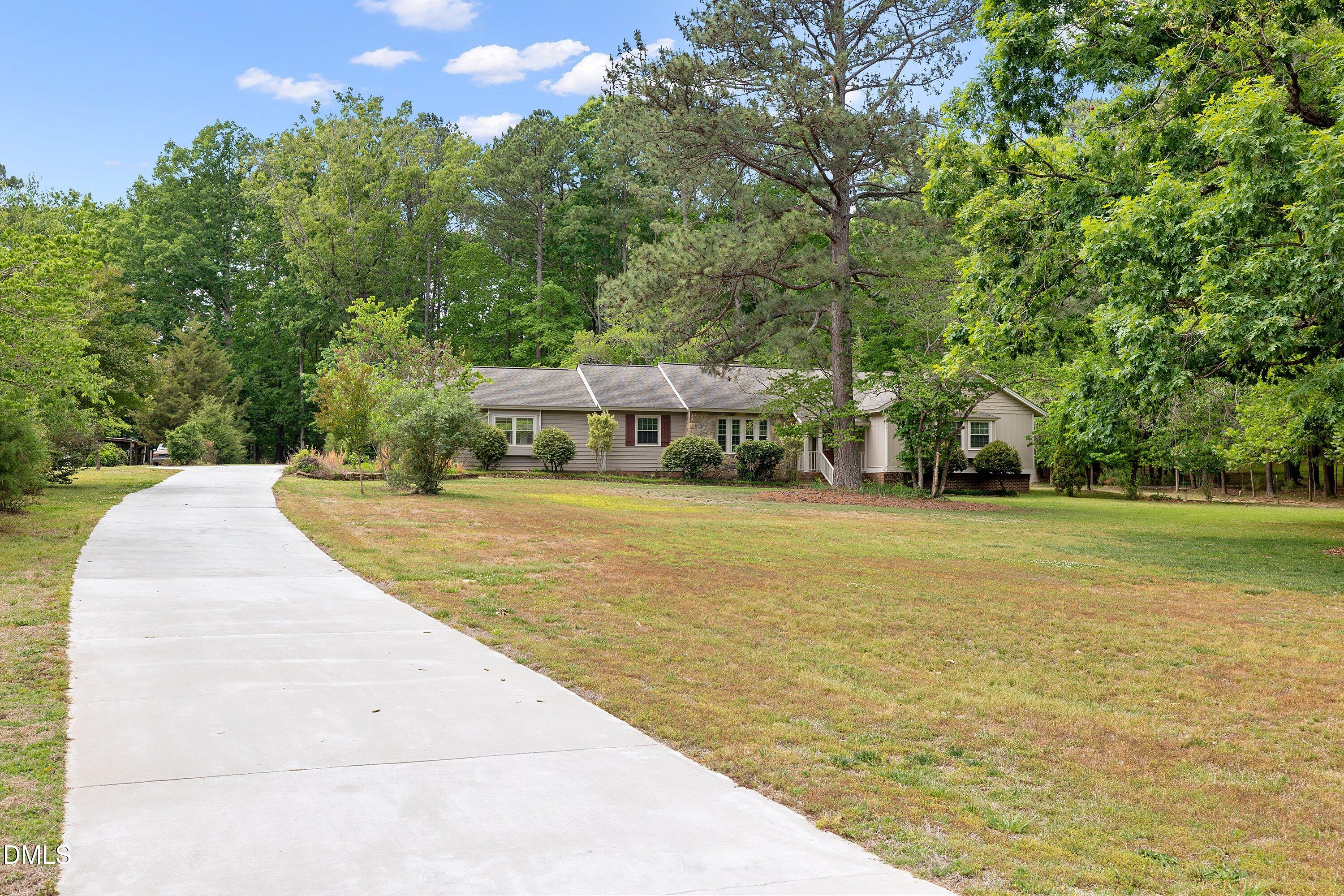8133 Holly Forest Road Wake Forest, NC 27587 - Photo 2 of 50 a view of swimming pool with trees