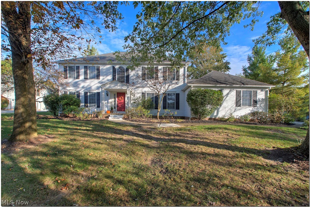 32099 Pinetree Road Pepper Pike, OH 44124 - Photo 35 of 35 Welcome to this sun drenched 3161+sq ft 5/3.5 Georgina Colonial has it all. Adorned with a multitude of windows, paneled front door, decorative crown & columns. The home sits back onto .87 of private green lush property