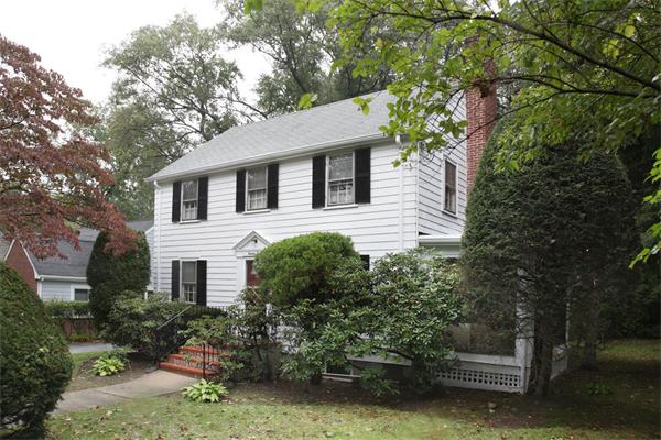 23 Garland Road Newton, MA 02459 - Photo 1 of 1 a front view of a house with a garden