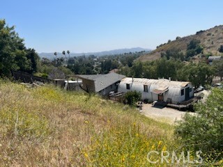 890 Valley Road Moorpark, CA 93021 - Photo 1 of 1 a view of backyard with a table and chairs