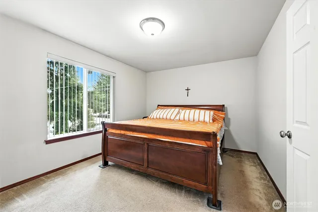 a room with a sink and a mirror