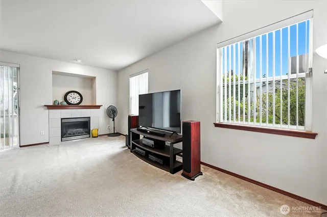 a view of livingroom with furniture and a flat screen tv