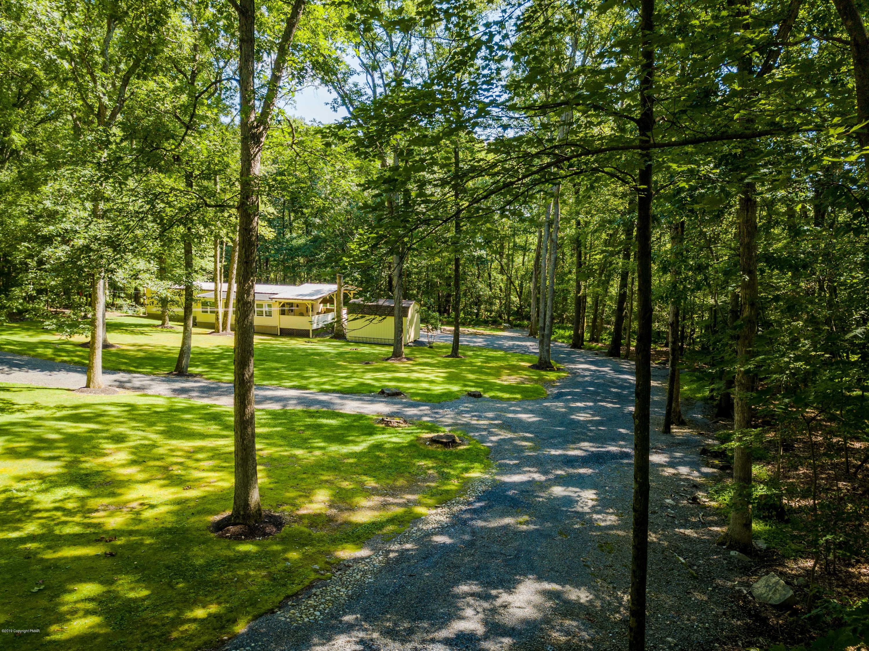 664 Cranberry Road East Stroudsburg, PA 18301 - Photo 13 of 14 a view of a park with large trees