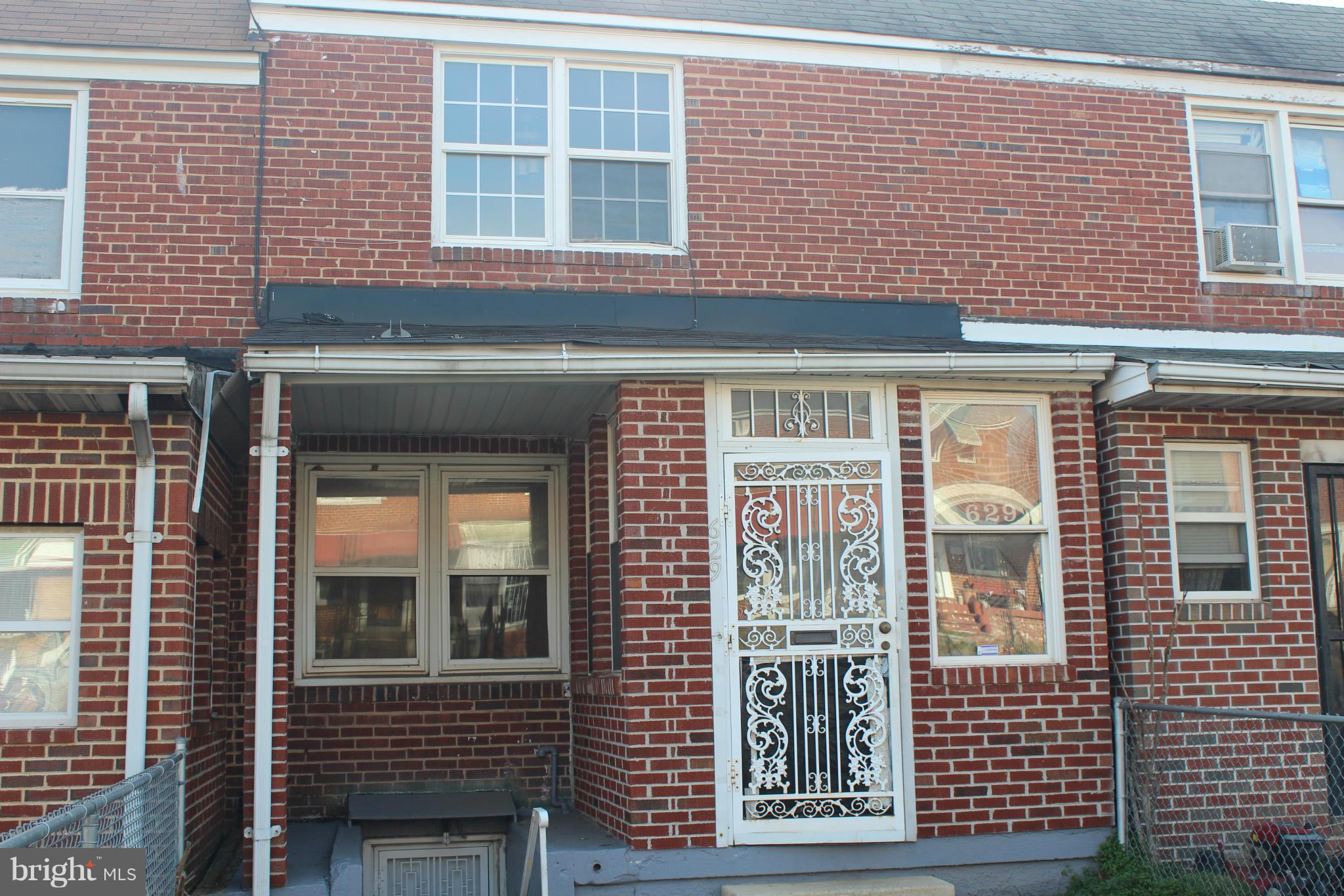629 Roundview Road Baltimore, MD 21225 - Photo 25 of 26 a front view of a building
