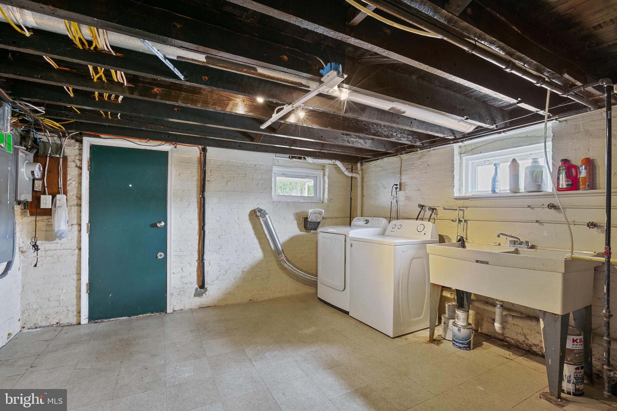 3343 Keswick Road Baltimore, MD 21211 - Photo 26 of 33 Basement Utility Room with Washer/Dryer