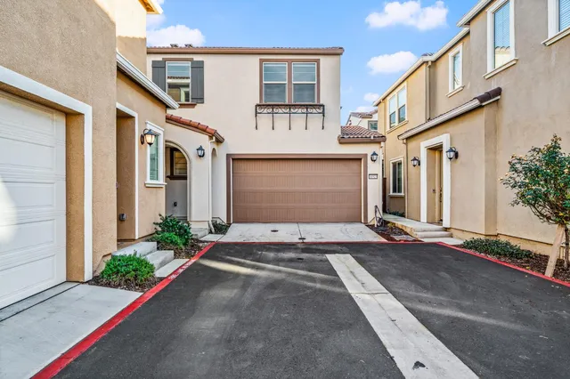 a view of a city with an ocean view