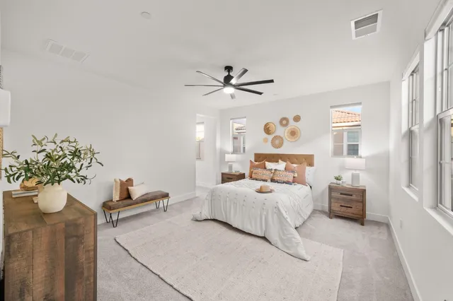 a bathroom with a sink double vanity granite and a mirror