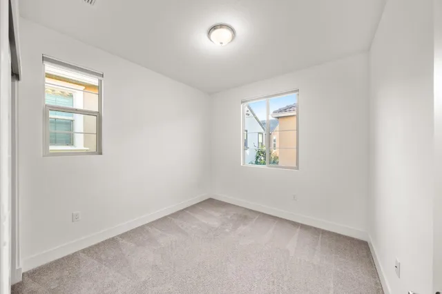 a view of a lake with a building in the background