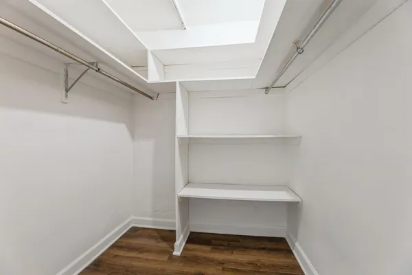 a view of an empty walk in closet