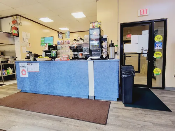 a view of an outdoor space and tennis court