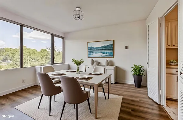 a view of a balcony with furniture