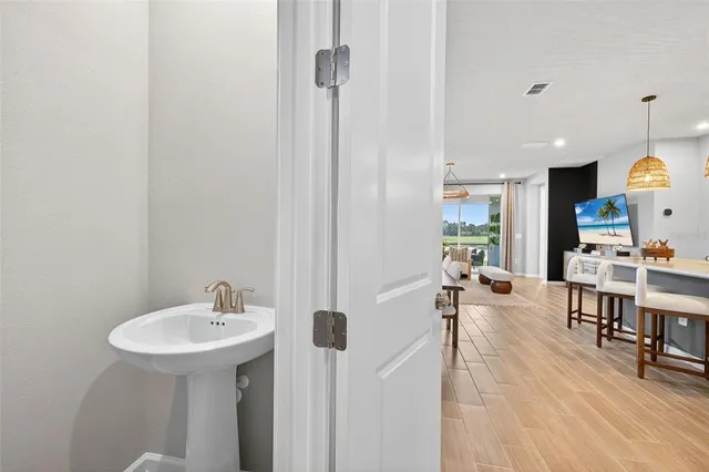 a view of a living room and dining room