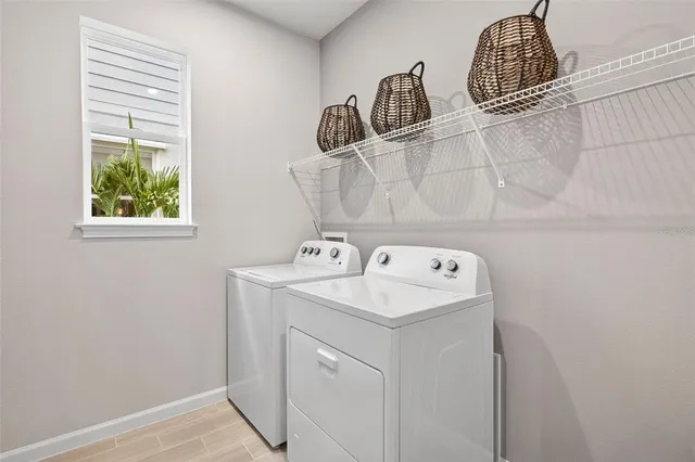a view of utility room with washer and dryer