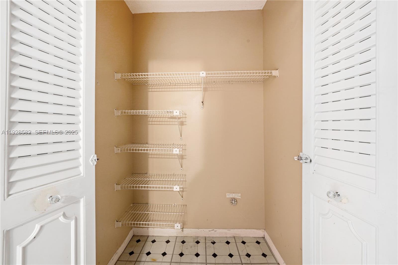 8305 Northwest 61st Street, Unit C305 Tamarac, FL 33321 - Photo 12 of 24 a bathroom with a shower