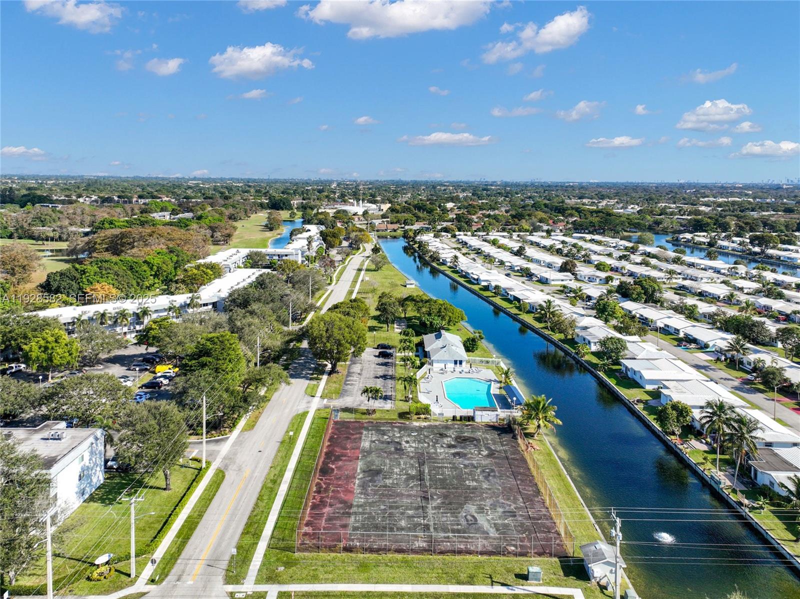 8305 Northwest 61st Street, Unit C305 Tamarac, FL 33321 - Photo 24 of 24 an aerial view of residential houses with outdoor space